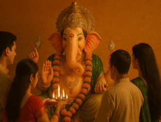 A group of people gathered around a large elephant statue, engaging in conversation and taking photos.